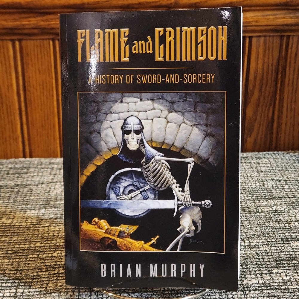 🔥 Flame and Crimson : A History of Sword.And Sorcery by Brian Murphy Paperback